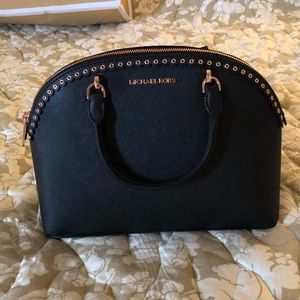 Black Michael Kors handbag with rose gold hardware